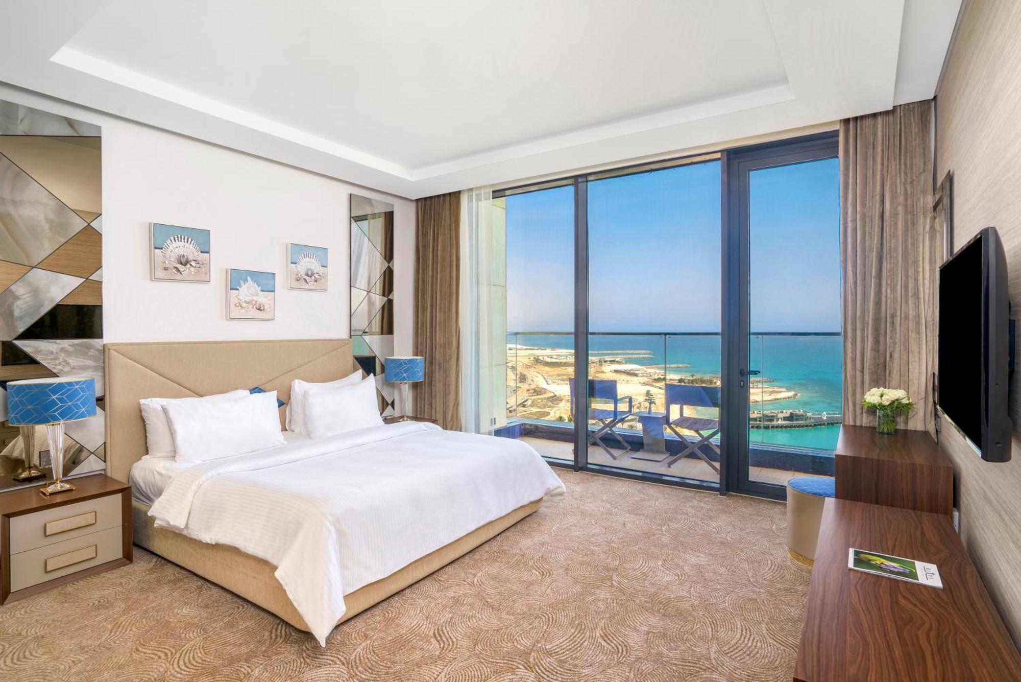 Rixos Premium Alamein El Alamein Quarto foto A bedroom at the hotel