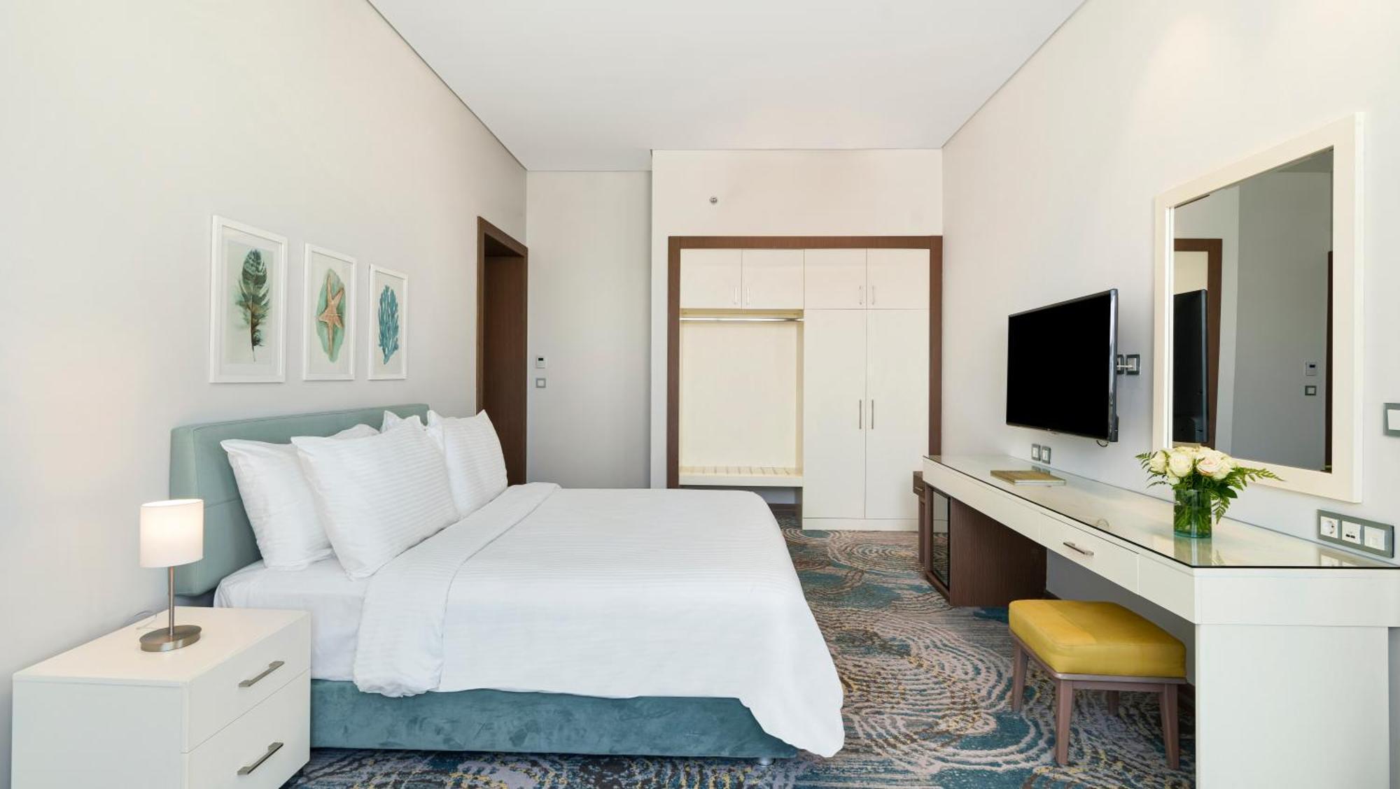 Rixos Premium Alamein El Alamein Quarto foto A bedroom at the hotel